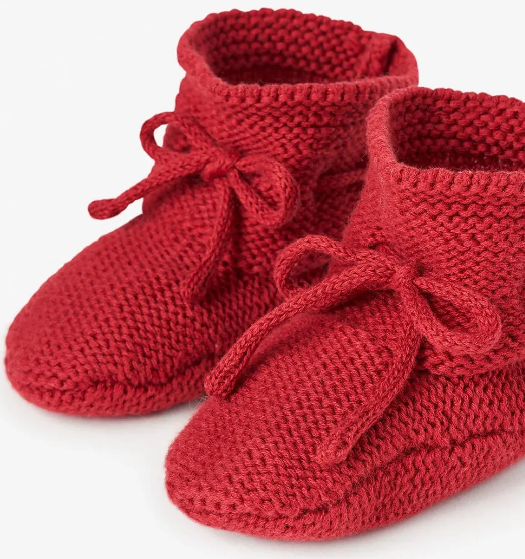 Red baby booties in beautiful garter knit