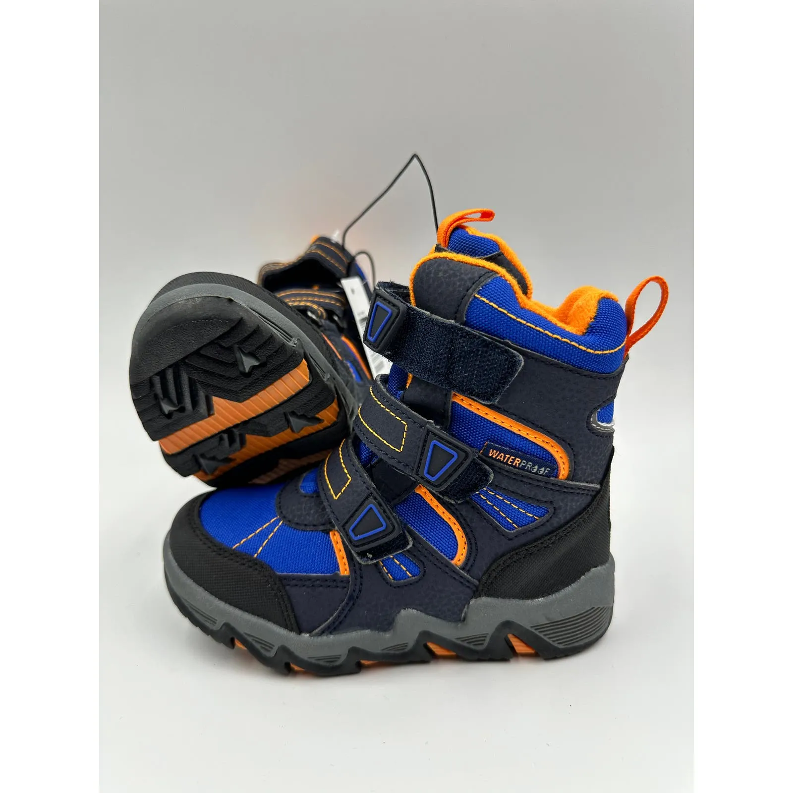 Small Kid Size 9.5, High Top Water Proof Blue and Black Snowboot with Orange Accents